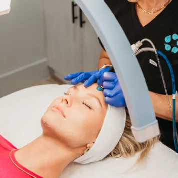 relive health hendersonville medspa employee administering Hydrafacial treatment to patient 1600x733 1